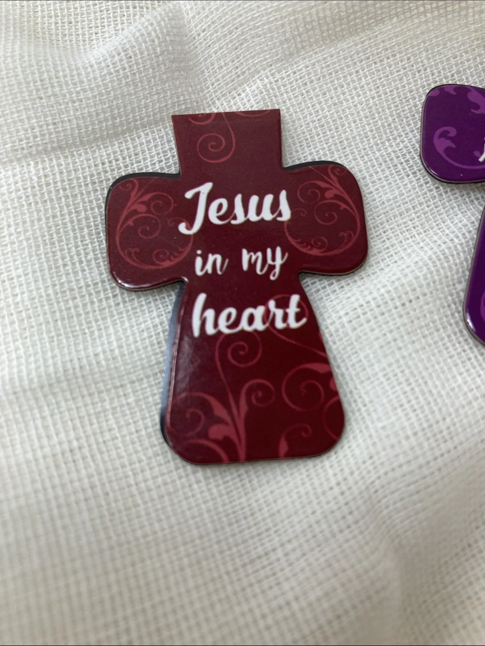 Magnetic cross shaped inspirational bookmarks.